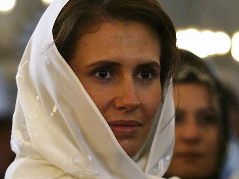 Asma Al Assad dons a veil. 