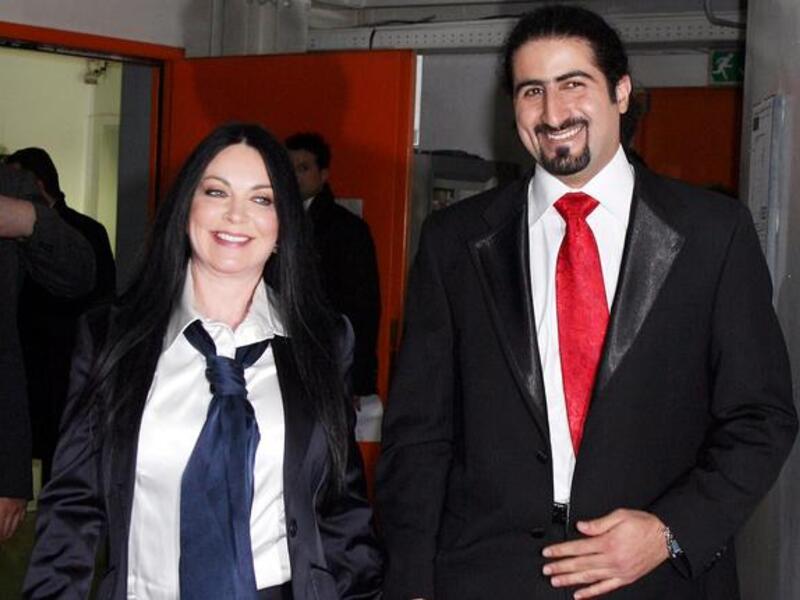 Omar, 29 and British wife, Jane Felix Brown (Zaina Alsabah), 54, who made headlines hiring a British pole-dancing surrogate for their twin children, court show biz while father prefers the quiet life. 