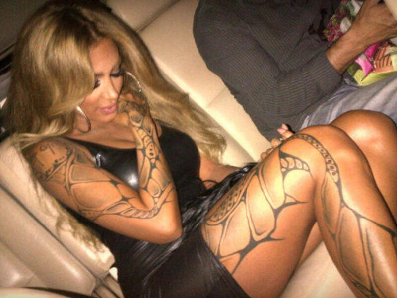 Maya Diab shows off some leg and tattoo
