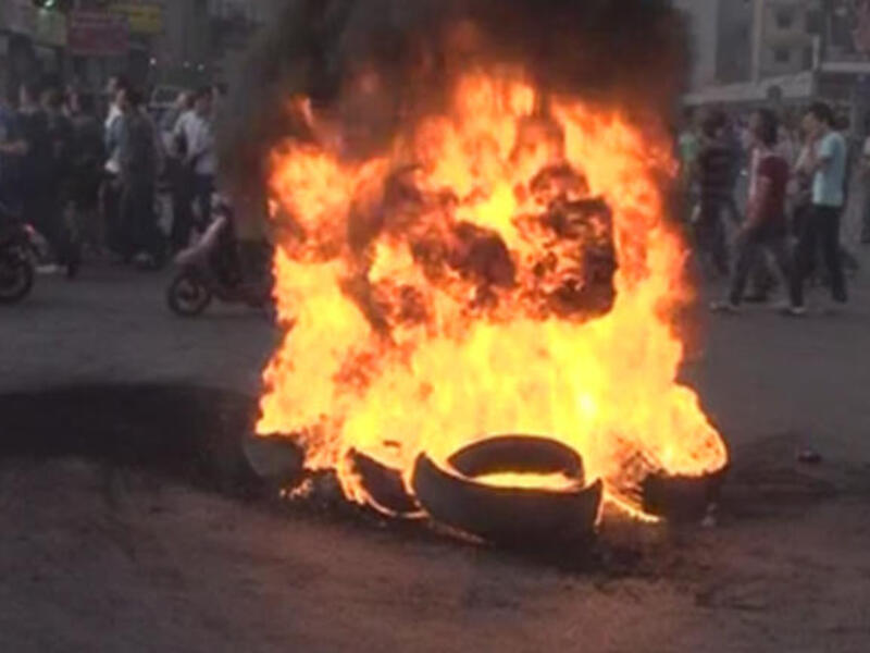 Lebanon's issues: Syrian spillover in LebanonTires burning in Lebanon