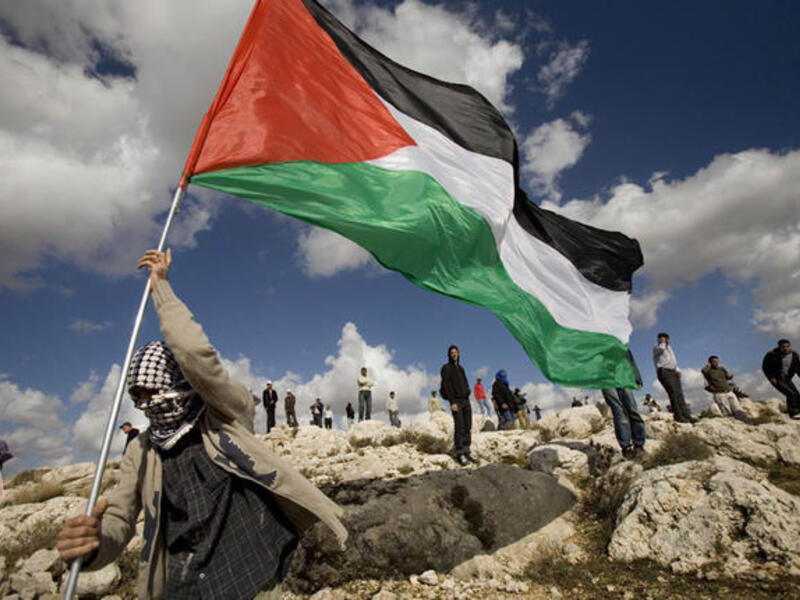 Akka Palestine flag raised at full mast