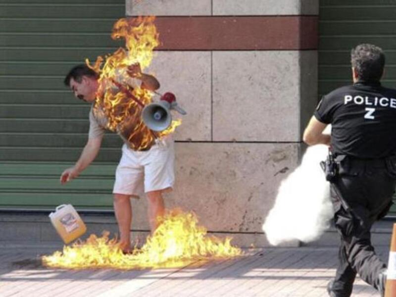 Greek man burns himself in protest