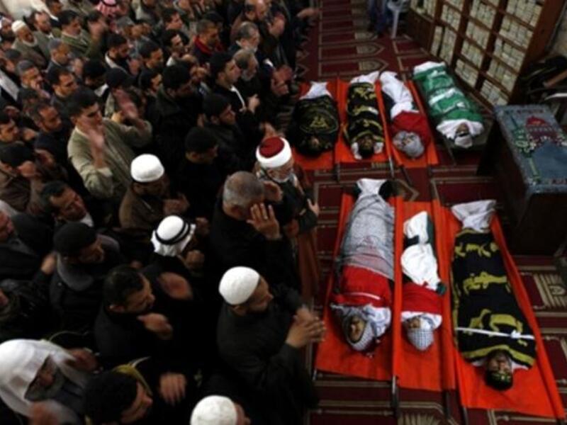 Palestinian mourners attend a funeral at a mosque in Gaza City. A day after eight Gazans were killed, among them two minors and four militants