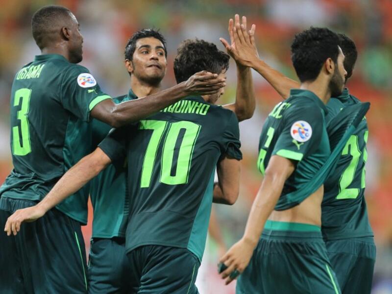 Saudi's Al-Ahli club players celebrate after scoring a goal during their AFC Champions League group D football match against Qatar's El-Jaish club at the King Abdullah Spots City in Jeddah on May 3, 2016. Al-Ahli won the match 2-0.
STRINGER / AFP