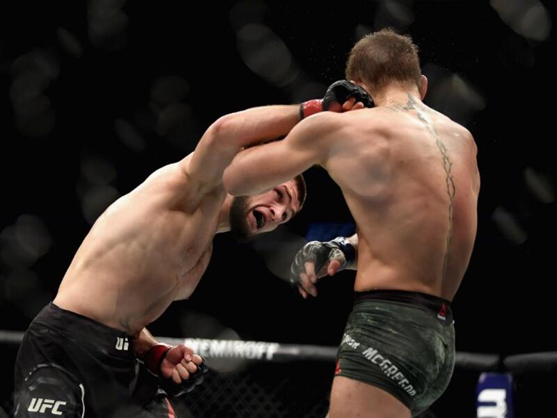 LAS VEGAS, NV - OCTOBER 06: Khabib Nurmagomedov of Russia (L) punches Conor McGregor of Ireland in their UFC lightweight championship bout during the UFC 229 event inside T-Mobile Arena on October 6, 2018 in Las Vegas, Nevada. Harry How/Getty Images/AFP
Harry How / GETTY IMAGES NORTH AMERICA / AFP