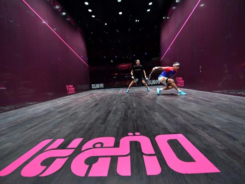 Mohamed El Shorbagy of Egypt (R) competes against James Willstrop of England during the finals of the PSA Dubai World Series Finals 2017 at Dubai Opera on June 10, 2017 in Dubai, United Arab Emirates.
GIUSEPPE CACACE / AFP