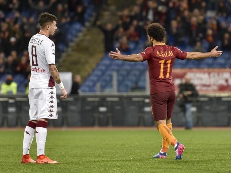 AS Roma's midfielder from Egypt Mohamed Salah (R) celebrates after scoring Torino , during the Italian Serie A football match AS Roma versus Torino on February 19, 2017 at Rome's Olympic stadium.
ANDREAS SOLARO / AFP