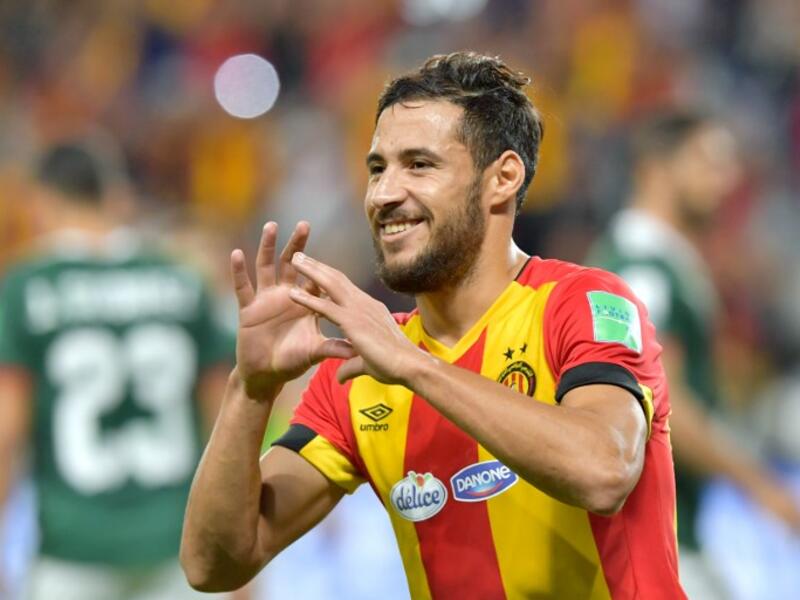 ES Tunis' forward Mohammed Youcef Belaili (R) celebrates after scoring a penalty kick during the fifth place match of the FIFA Club World Cup 2018 football tournament between Tunisia's Esperance Tunis and CD Guadalajara at the Hazza Bin Zayed Stadium in Abu Dhabi, the capital of the United Arab Emirates, on December 18, 2018.
Giuseppe CACACE / AFP