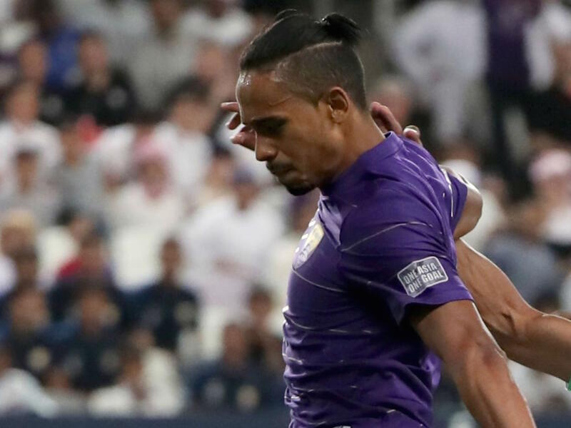  Brazilian midfielder Caio follows Murad Batna of Al Wahda as the Arab nation cracked down on the style of various footballers (Photo: Goal)