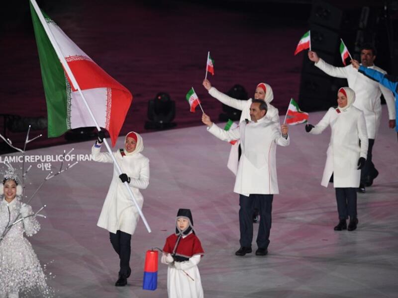 The IOC backed down on a decision to deny gift Samsung smartphones to both Iranian and North Korean athletes
