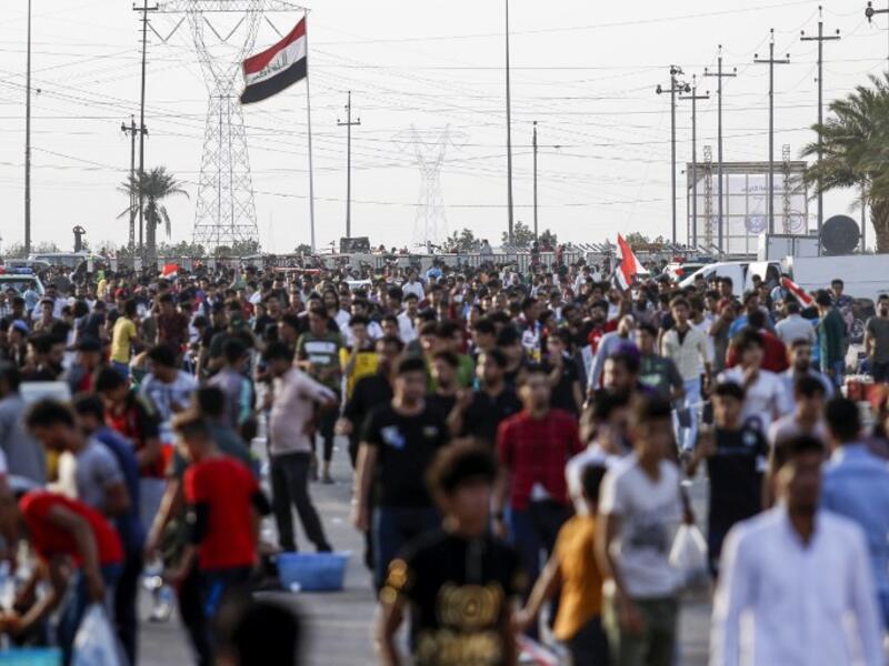 Football fans arrive at Basra Sports City stadium in the southern Iraqi city on March 21, 2018 to attend the international friendly match between Iraq and Qatar.
HAIDAR MOHAMMED ALI / AFP