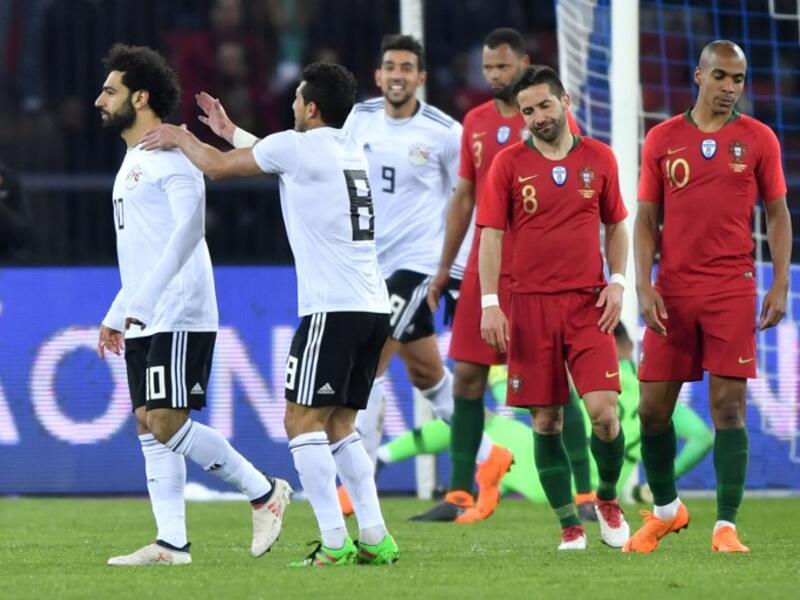 Egypt's forward Mohamed Salah (L) celebrates after scoring a goal during the international friendly football match between Portugal and Egypt at Letzigrund stadium in Zurich on March 23, 2018.
Fabrice COFFRINI / AFP