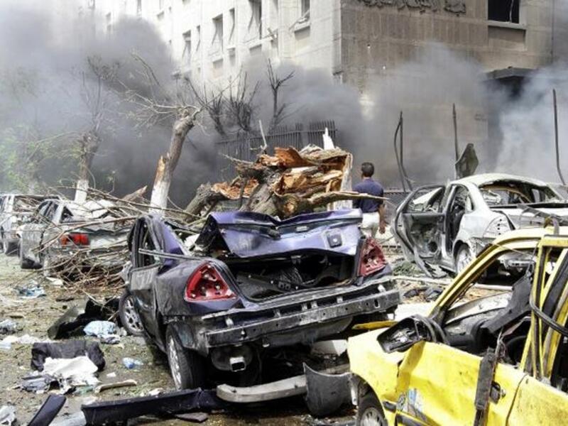 Damascus is rocked by a huge car bomb, which was followed by intense gunfire (AFP/ Louai Beshara)
