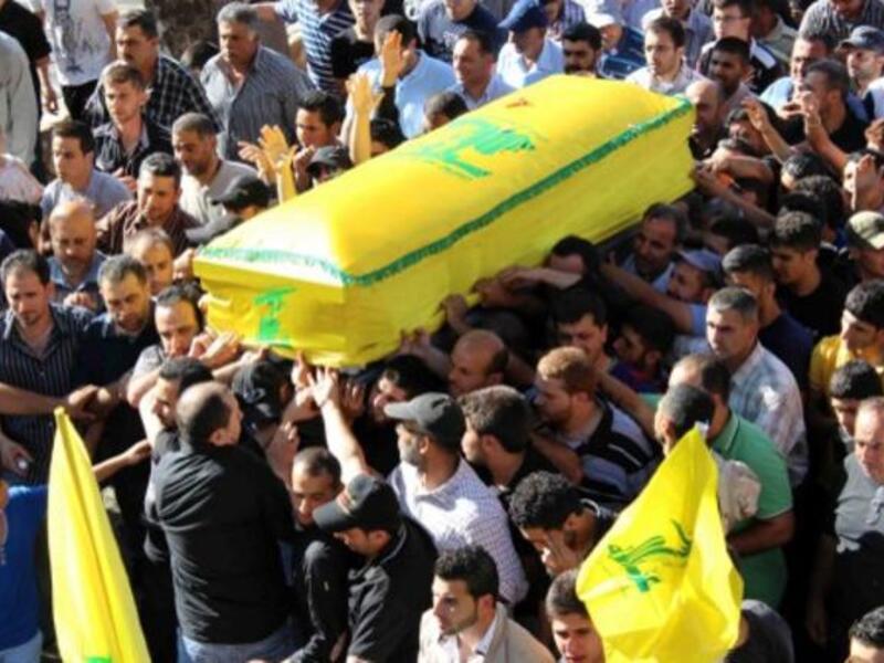 Hezbollah honors its dead fighter, killed in Syria in July, 2013 (Image Ali Dia / AFP)