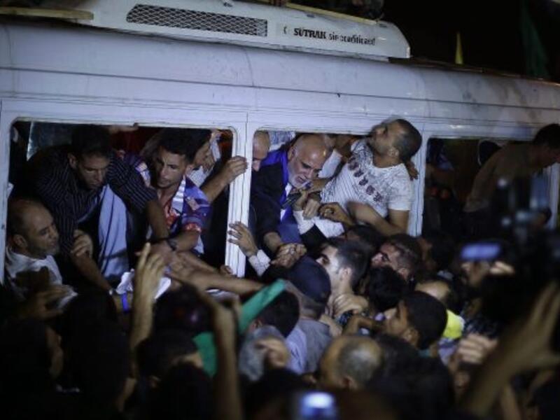 Israel frees 26 Palestinian prisoners as part of peace negotiations with the Palestinians. [Photo by Reuters]