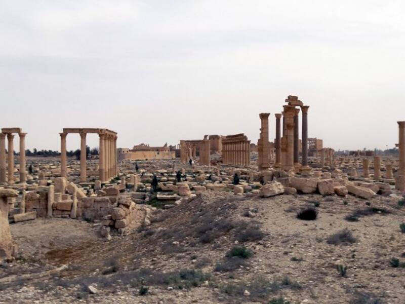 This file photo taken on April 7, 2016 shows Russian army sappers check for mines in the ancient Syrian city of Palmyra. (AFP/Max Delaney)