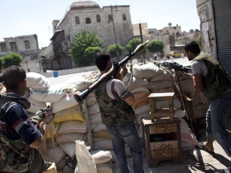 Conflicting reports continue to emerge about ongoing clashes in Syria's south, where pockets of what is largely considered as the last ample force of the Western-backed FSA are battling Syrian regime forces reinforced by Iranian and Hezbollah fighters. (AFP/File) 