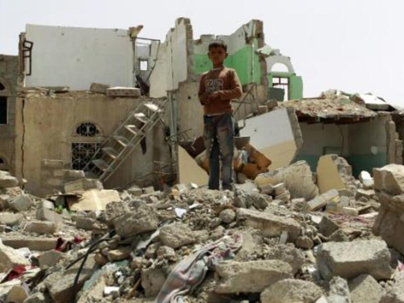 A child walks through the rubble after an airstrike in Taiz, Yemen. (AFP/File)