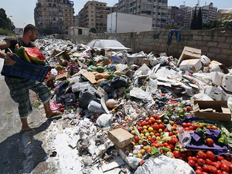 Piles of uncollected trash are seen on the streets of Beirut. (File photo)