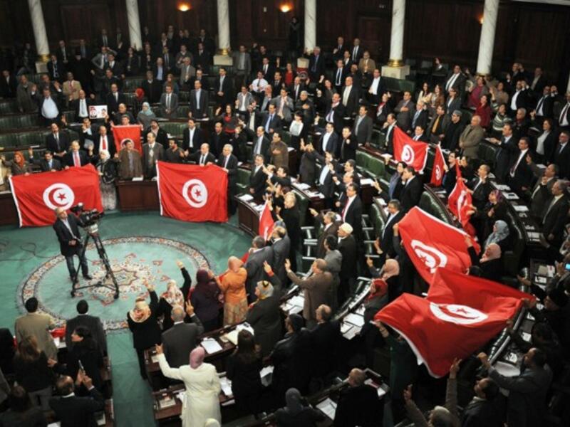 Critics of the new law voiced concerns over putting customized conditions that fit specific parties who may exploit the country's difficult economic situation. (AFP/File)