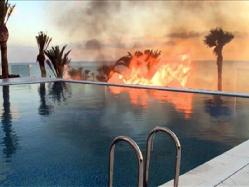 حريق في قصر يعتقد بأنه مملوك للرئيس التونسي السابق بن علي ضمن حركة الاحتجاجات التي سادت تونس.