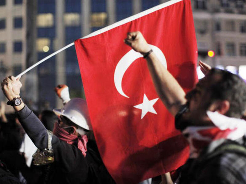 Protests initially sparked by a brutal police action against a local conservation battle to save Istanbul's Gezi Park snowballed into nationwide demonstrations against the Islamic-rooted government.( AFP/Gurcan Ozturk)