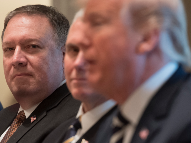CIA Director and Secretary of State nominee Mike Pompeo (L) attends a lunch meeting with U.S. President Donald Trump (R) and Saudi Arabia's Crown Prince Mohammed bin Salman, and members of his delegation, in the Cabinet Room of the White House in Washington, DC, March 20, 2018.  (SAUL LOEB / AFP)