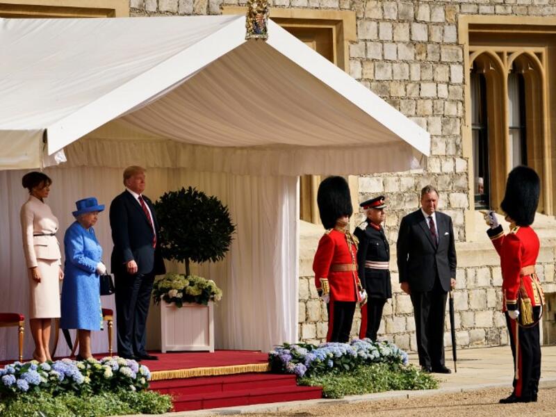 Britain's Queen Elizabeth II stands with US President Donald Trump and US First Lady Melania Trump on their arrival at Windsor Castle in Windsor, west of London, on July 13, 2018 on the second day of Trump's UK visit. (Brendan Smialowski / AFP)