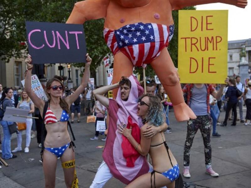 Tens of thousands of protesters demonstrated in London on Friday against US President Donald Trump, whose four-day visit to Britain has been marred by his extraordinary attack on Prime Minister Theresa May's Brexit strategy. (Niklas HALLEN / AFP)
