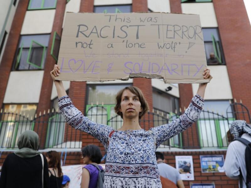 People attend a vigil outside Finsbury Park Mosque in north London on June 20, 2017, following a van attack on pedestrians nearby on June 19. Ten people were injured and a man also died at the scene after a van drove into a crowd of Muslim worshippers near a mosque in London in the early hours of Monday. (Tolga Akmen/AFP)