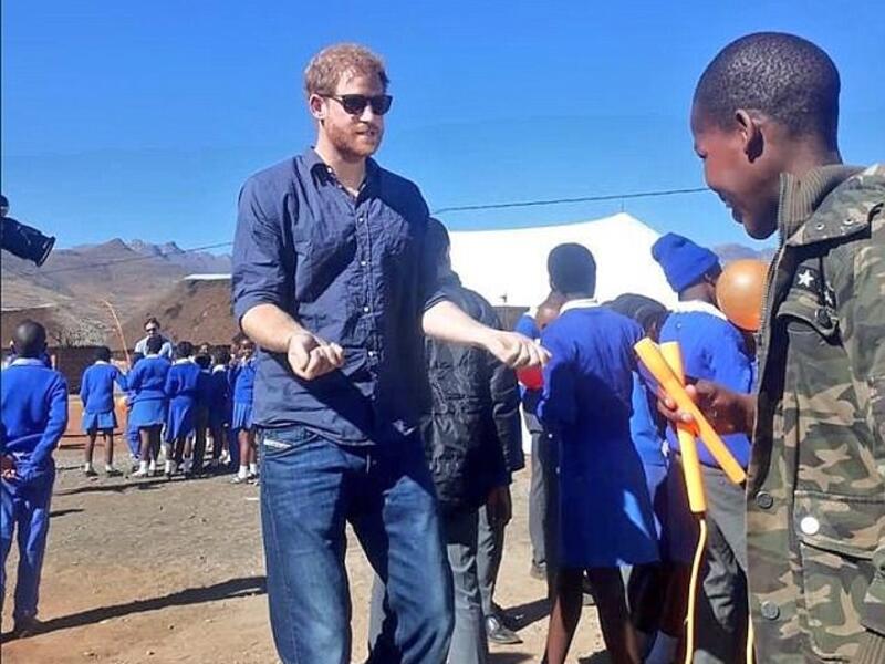 The Duke of Sussex, 33, looked relaxed as he met with local children at the Phelisanong Children’s Centre. (Facebook/Phelisanong Children’s Centre)