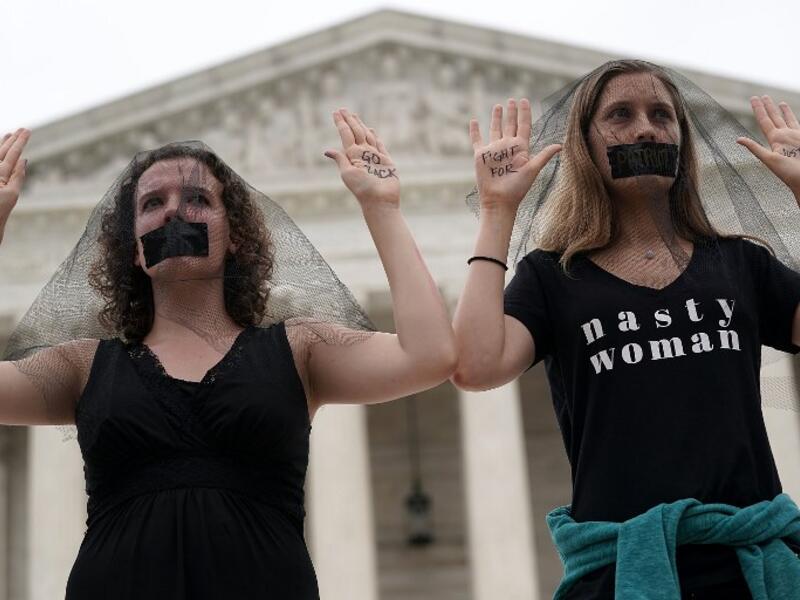 Activists occupy the front steps of the U.S. Supreme Court to protest against the confirmation of Judge Brett Kavanaugh to the Supreme Court October 6, 2018 in Washington, DC. (Alex Wong/Getty Images/AFP)