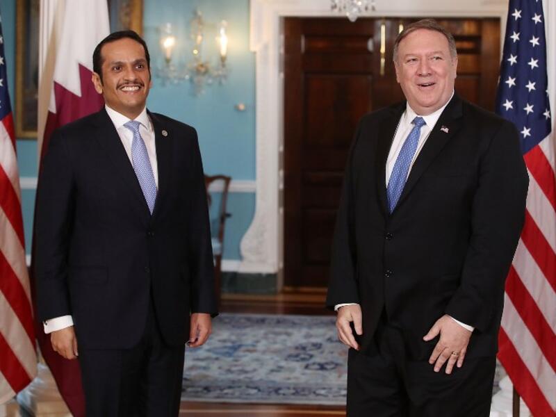 U.S. Secretary of State Mike Pompeo (R), welcomes Qatari Foreign Minister Sheikh Mohammed bin Abdulrahman Al Thani, at the Department of State, on June 26, 2018 in Washington. (AFP/ File)