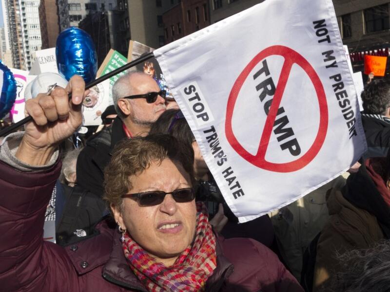 Protests have taken place across the world in reaction to Trump's inauguration (Don Emmert/AFP)