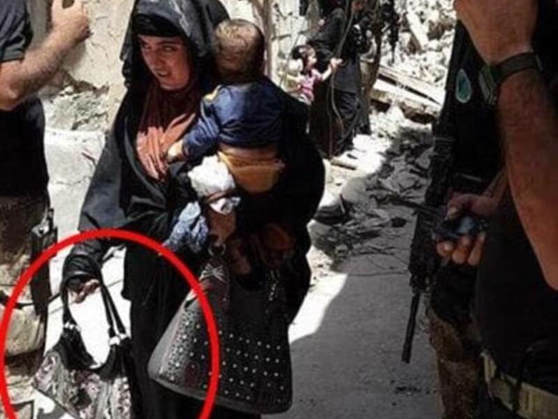 The woman in this photo reportedly blew herself up moments later (al-Mawsleya)