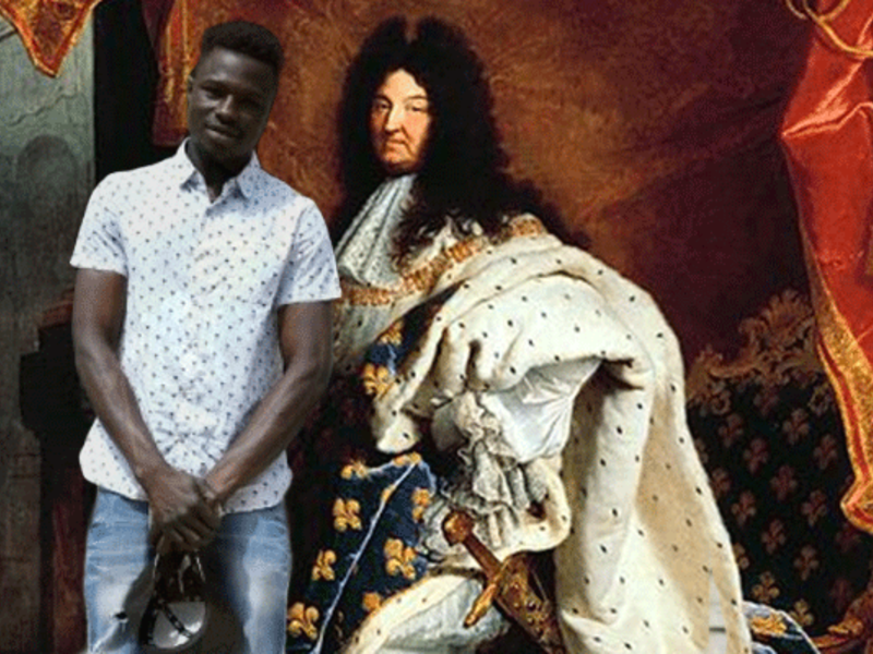 Mamoudou Gassama with infamous member of French aristocracy, Louis XIV (Rami Khoury/Al Bawaba)