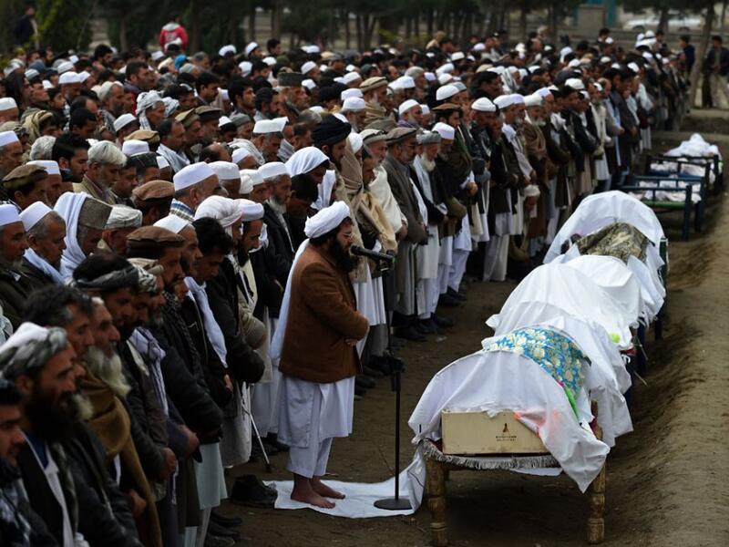 A funeral for a dozen Afghan migrants who had drowned in the Aegean Sea. (AFP/Wakil Kohsar)