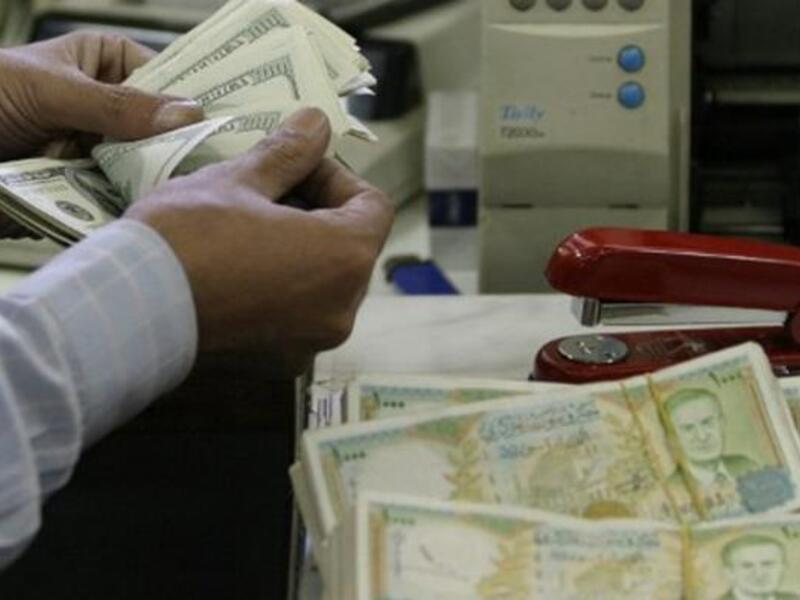 The raises and tax law changes will apply starting October, according to an Arabic media report. (AFP/File)