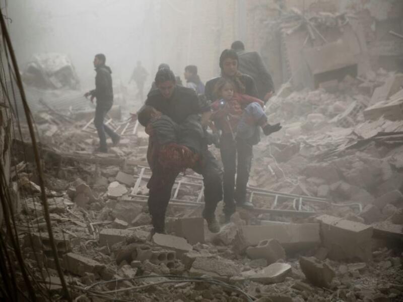 London-based Syrian Network for Human Rights says nearly 4,000 women and children among those killed by Syrian regime. (AFP/File)