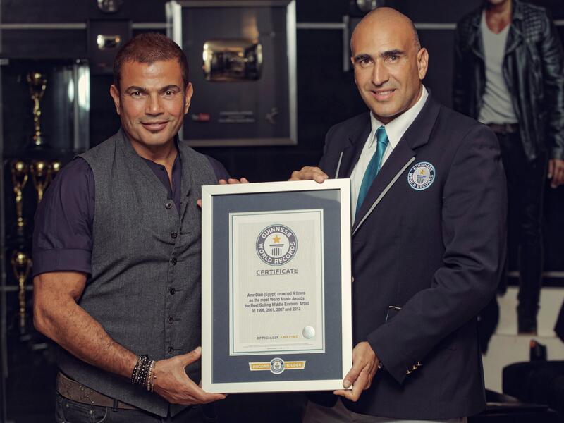 Amr is the 1st Arab singer to achieve a Guinness World Record title for Most World Music Awards for Best Selling Middle Eastern Artist. (Facebook)