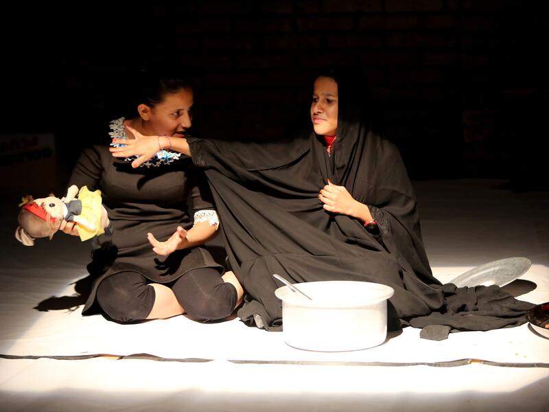 Teenage girls perform at a drama therapy workshop in Baghdad on October 1, 2015.  (AFP/File)