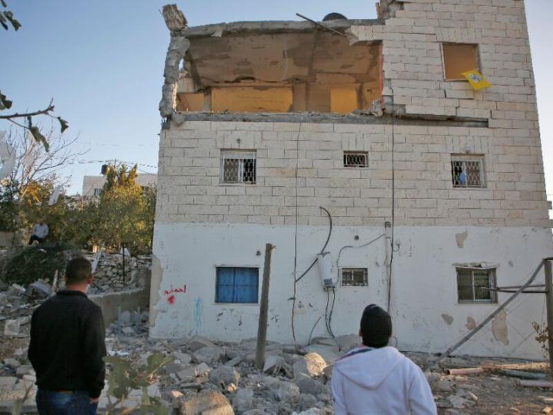 Israeli politicians defend demolishing the homes of Palestinians who carry out attacks as a deterrent against future violence, but critics say it amounts to collective punishment (AFP Photo/ABBAS MOMANI)
