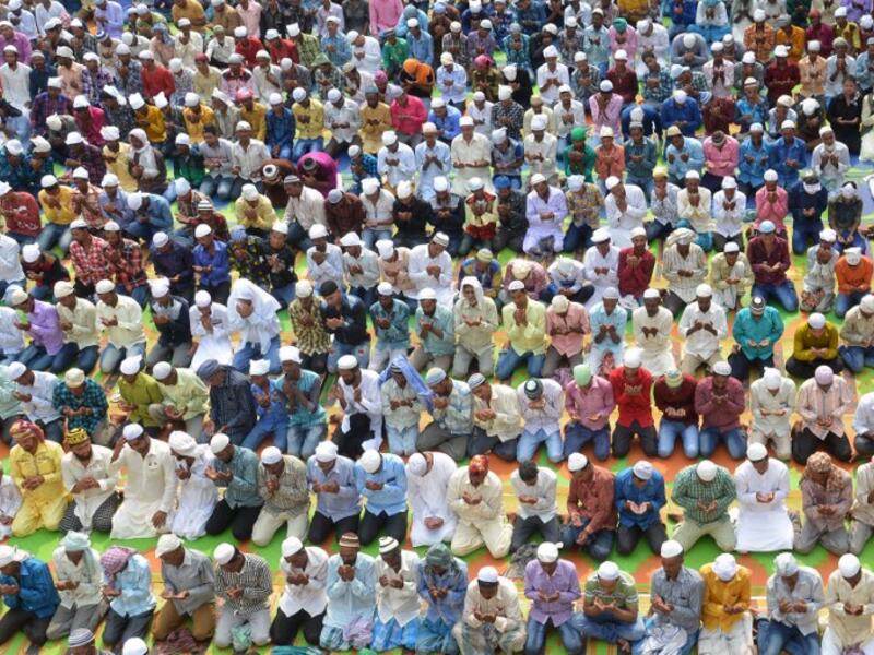 Indian Muslims take part in Eid al-Fitr prayers at the Khairuddin Mosque in Amritsar on June 26, 2017. Muslims around the world are celebrating the Eid festival, marking the end of the fasting month of Ramadan. (Narinder Nanu/AFP)