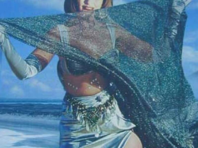 Yura sinking low feeling: as she lands herself in a spot of sandy strife