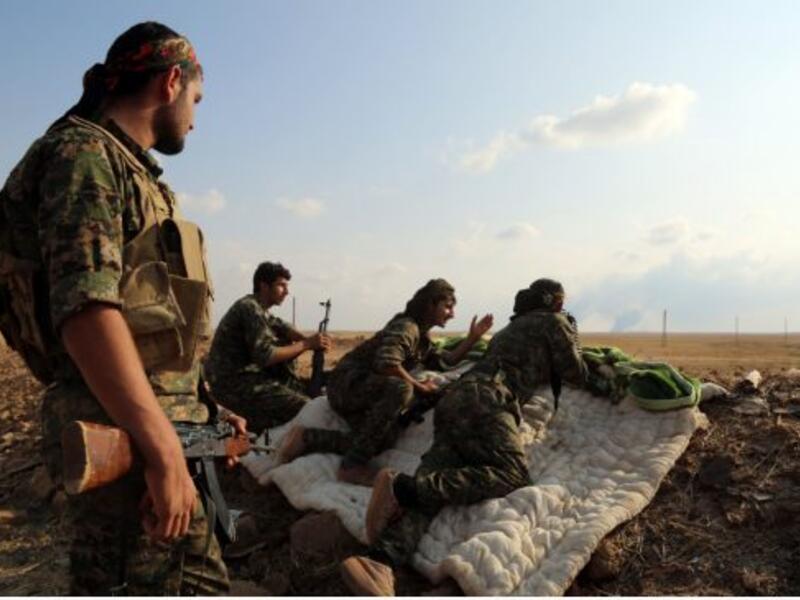 SDF forces post up for their al-Hol offensive, which began Oct 31. (AFP/File)