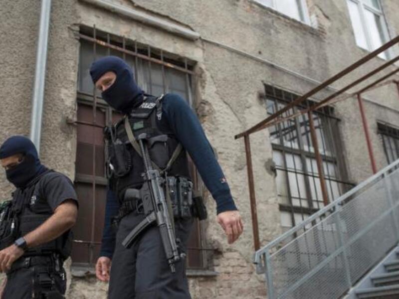 German police on a raid in a neighborhood suspected of militant activity. (AFP/File)