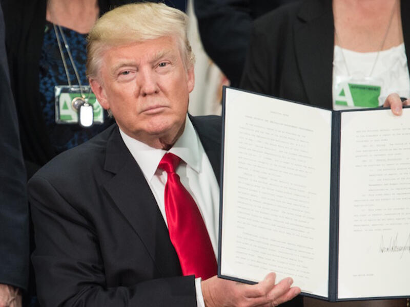 US President Donald Trump signs bill to give prosecutors more power to target sex trafficking advertisements online. (AFP/ File Photo)