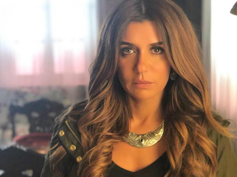 Ghada Adel wore the hijab for about two years before returning to acting in the film 'Al Basha Talmiz' alongside