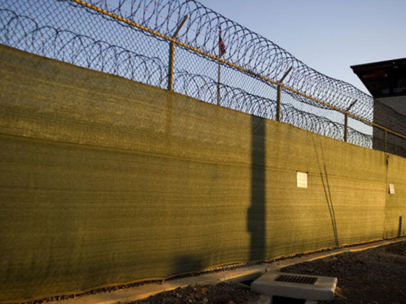 Younis Abdurrahman Chekkouri was taken into custody shortly after his flight home. (AFP/Jim Watson)