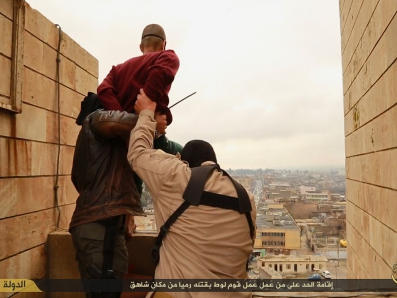 isis throws man from building 